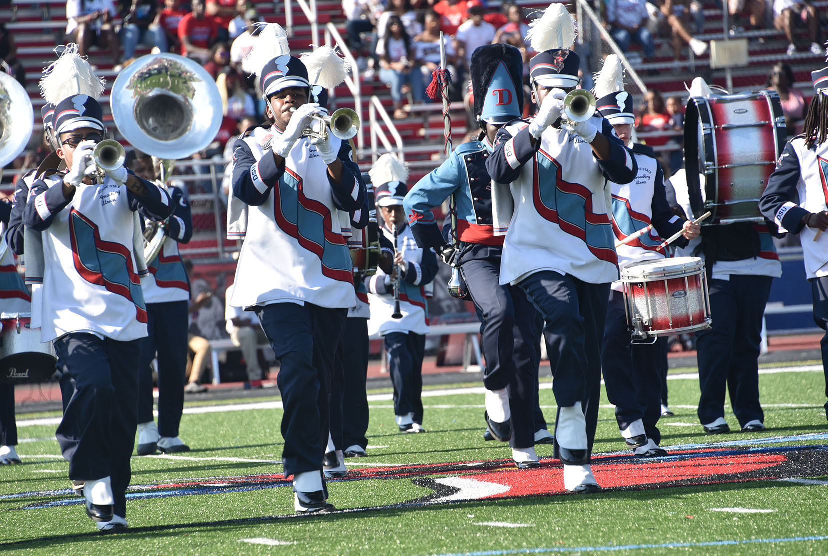 University names two alumni to lead Approaching Storm Band